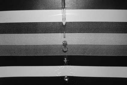 b&w layered fabric and water droplets